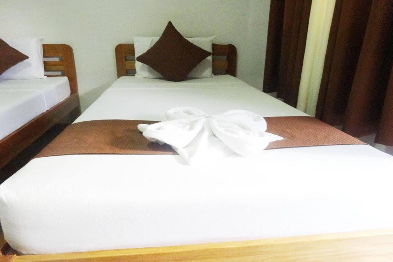 Tenzai Homestay Puerto Princesa ภายนอก รูปภาพ